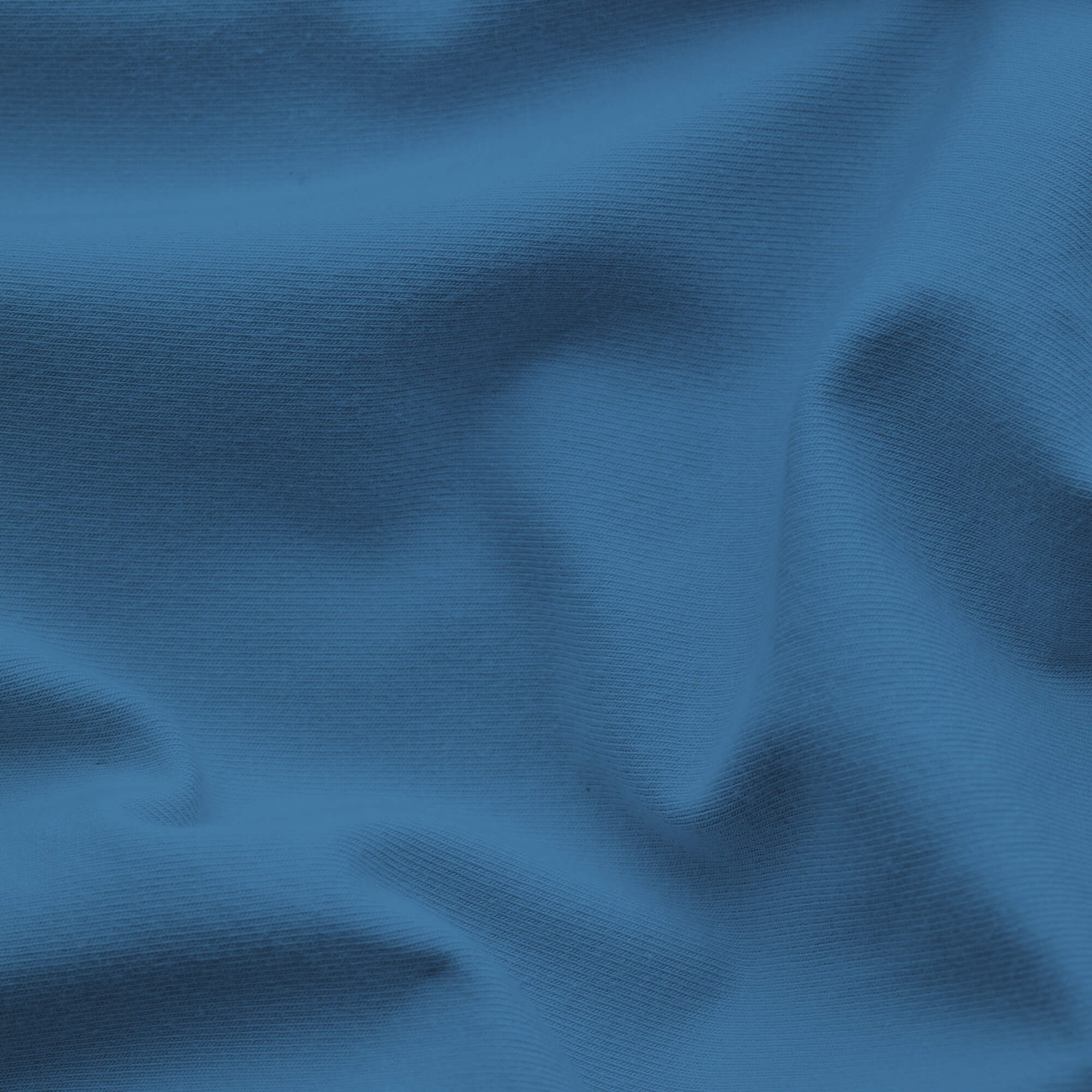 Spannbettlaken Pure Topper von Schlafgut in Farbe blue mid aus 95% Bio-Baumwolle und 5% Elasthan Stoff