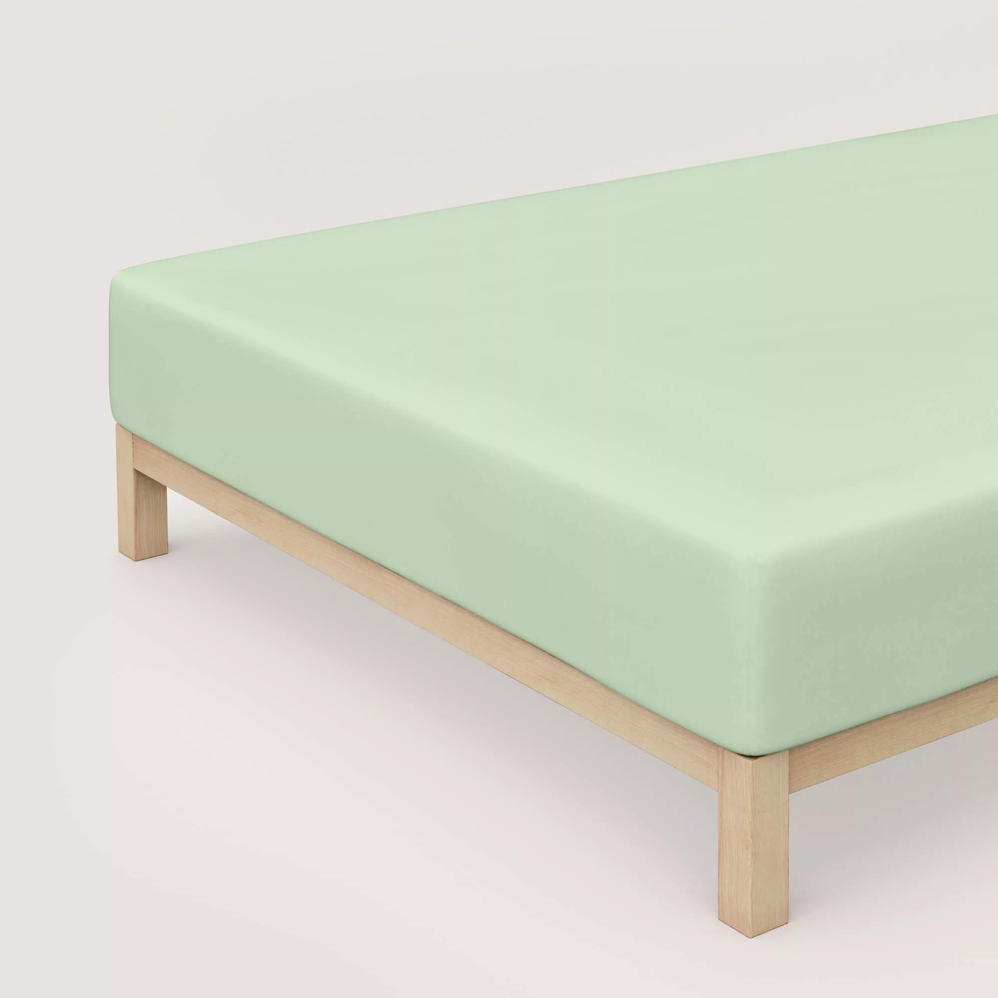 Spannbettlaken Pure Boxspring von Schlafgut in Farbe green light aus 95% Bio-Baumwolle und 5% Elasthan auf Bett in Vogelperspektive