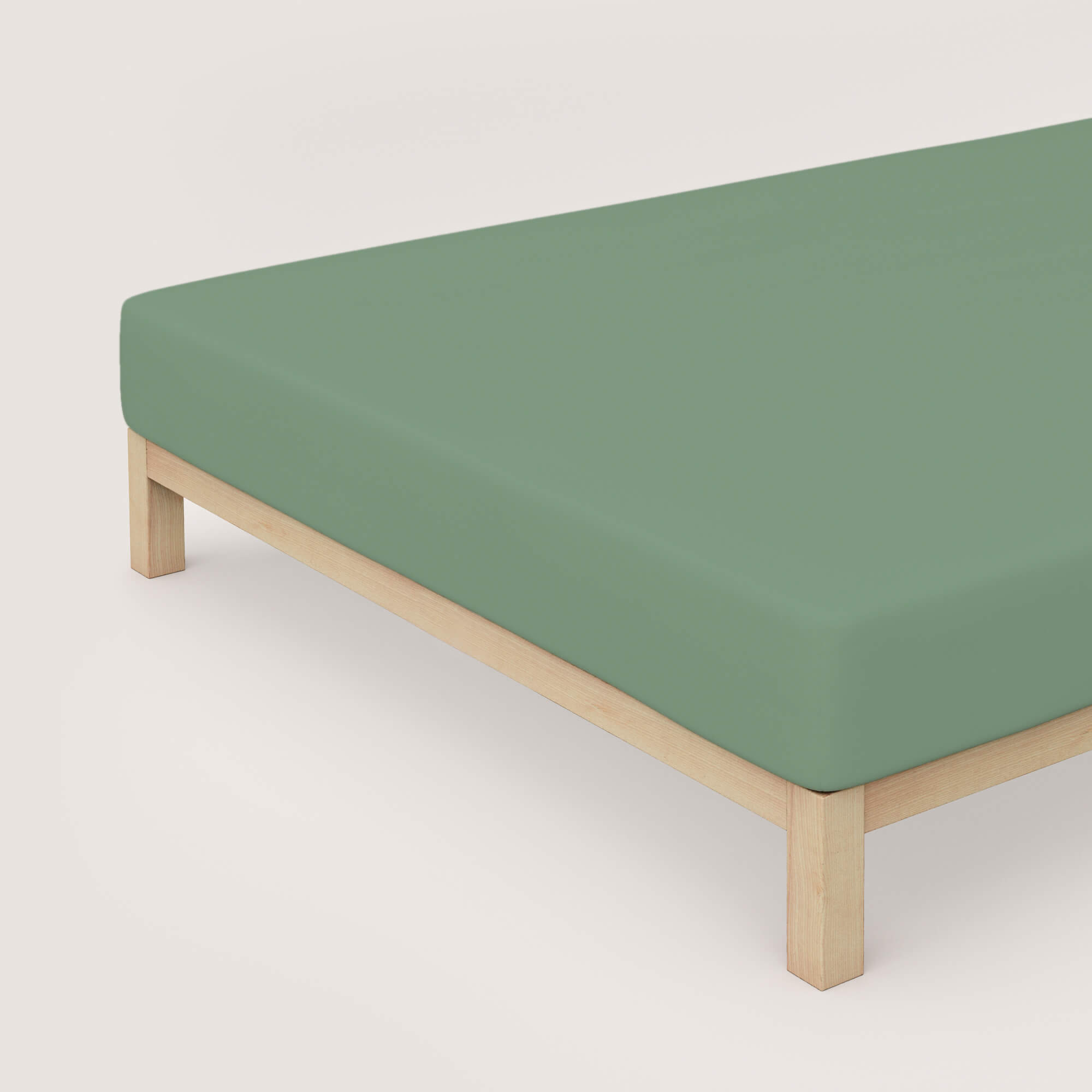Spannbettlaken Premium green mid auf Bett Spannbettlaken Premium von Schlafgut in Farbe green mid aus 95% Bio-Baumwolle und 5% Elasthan auf Bett in Vogelperspektive