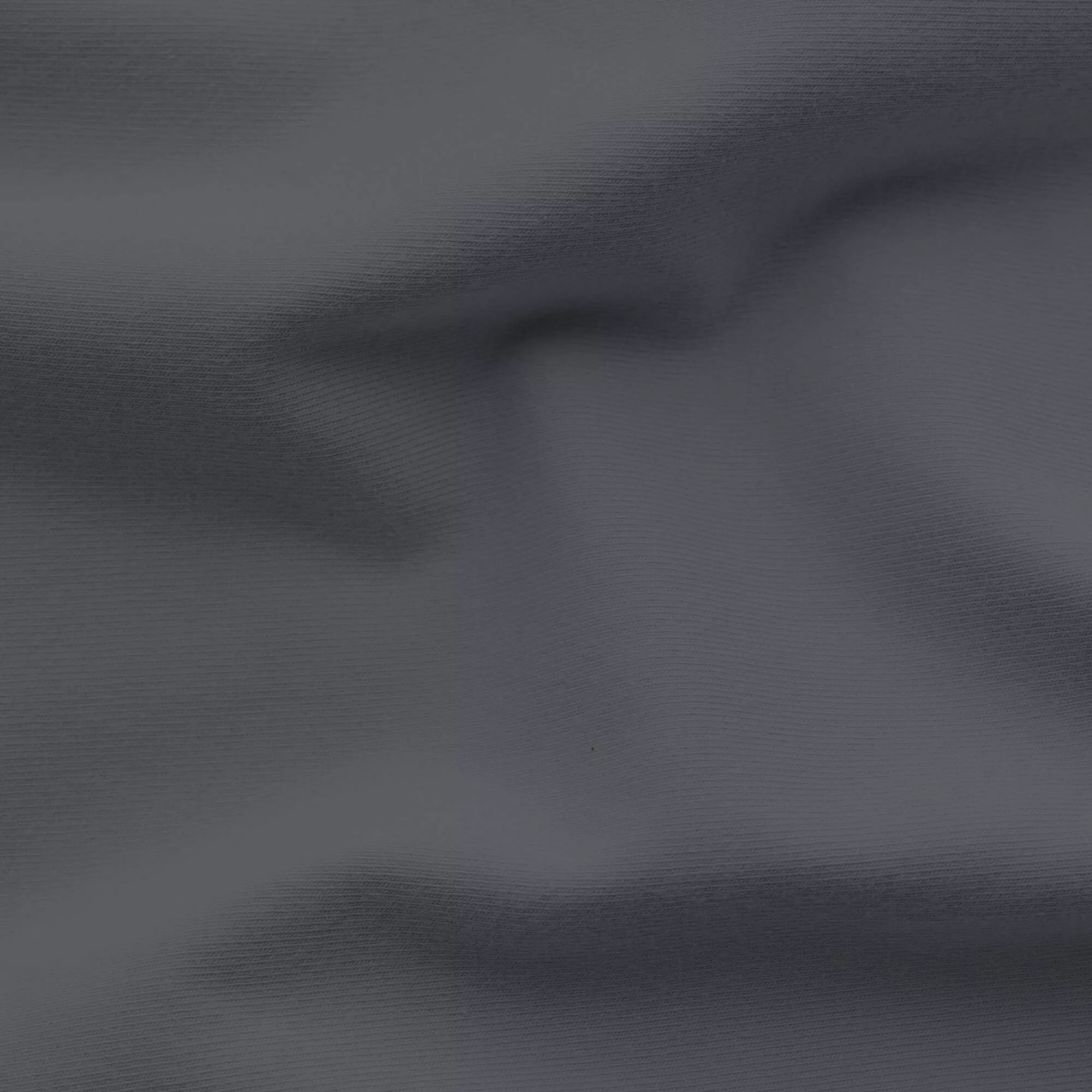 Spannbettlaken Premium von Schlafgut in Farbe grey deep aus 95% Bio-Baumwolle und 5% Elasthan auf Bett seitlich